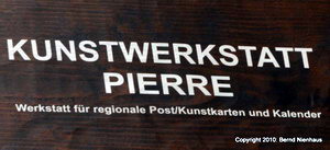 Logo-Besancon-Holzschild